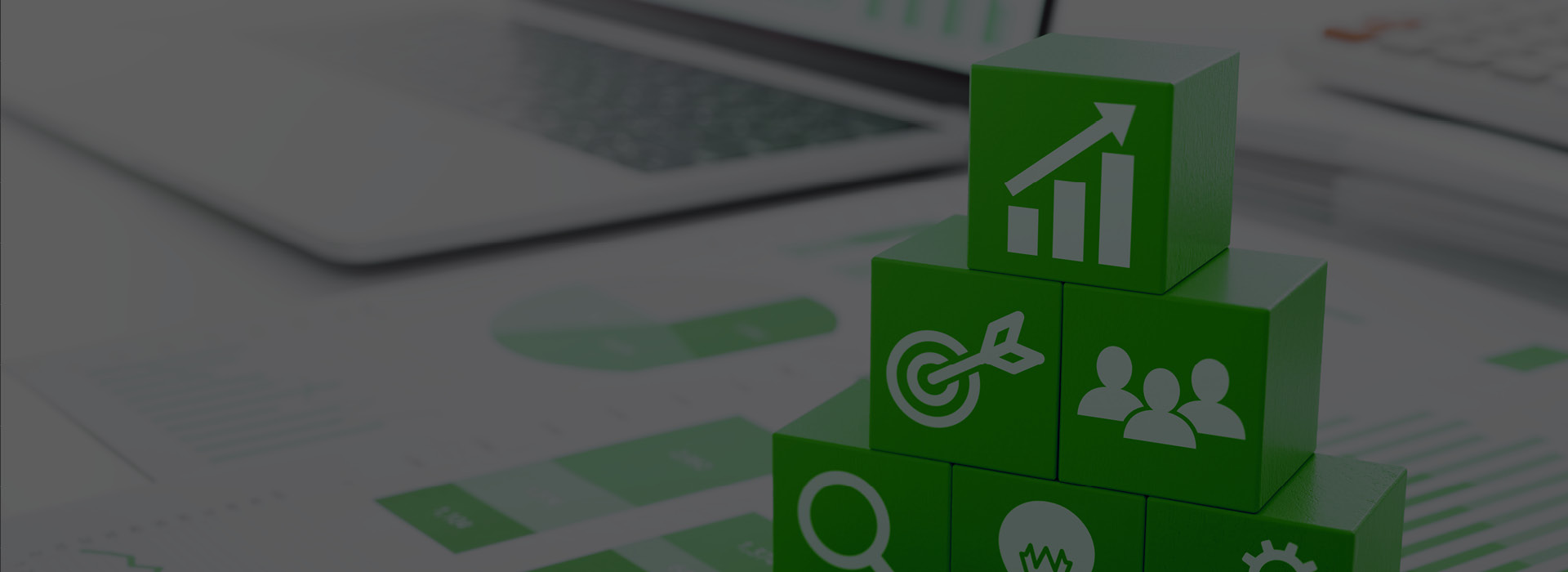 Business analytics and procurement services represented by green cubes with various business icons